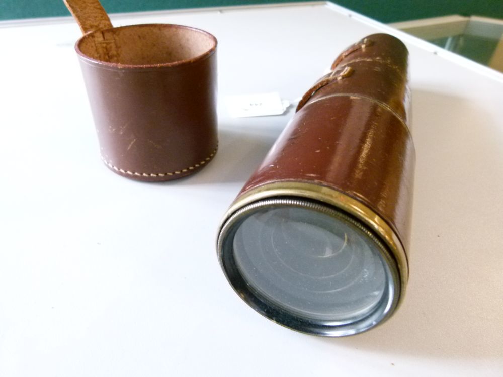 Early 20th Century Military issue signalling telescope, Dollond London No12278, with stitched hide - Image 5 of 7