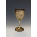 Victorian silver goblet with repoussé scroll decoration and presentation to 'Holytown P. School