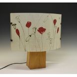 Contemporary oak table lamp having printed poppy decorated shade, overall height 46cm