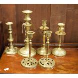 Six brass candlesticks