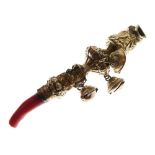 19th Century Continental gilded white metal child's teether with coral finial, three attached
