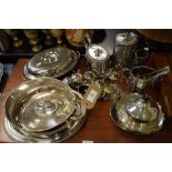 Silver plated three piece tea set, various tureens and covers, two sets of cased servers, a set of