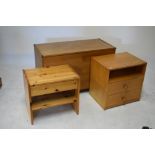 Two yellow pine bedside units and a mid 20th Century bedding chest or trunk (3)