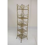 Gilt-painted wrought metal five-tier what-not of rustic branch form with slatted shelves and