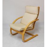 Beech framed bentwood cantilever armchair upholstered in off-white cotton covers