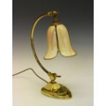 Art Nouveau style adjustable brass desk lamp having mottled leaded glass shade, 40cm high