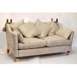 Quality modern Knoll settee with drop-arms, upholstered in pale foliate damask (purchased within the