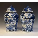 Large pair of 20th Century blue and white porcelain baluster jars and covers, each with moulded