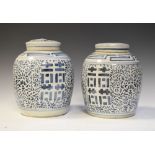 Pair of Chinese provincial porcelain ginger jars and covers having underglaze blue decoration, one
