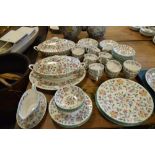 Extensive Minton Haddon Hall dinner service comprising tureens, dinner plates, tea cups, saucers etc