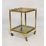 Good quality two tier brass and glass cocktail trolley, 58cm high x 39cm wide