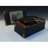Tin plate magic lantern and slides in printed card box of issue