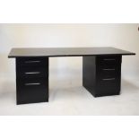 Late 20th Century black ash finish twin pedestal desk fitted six drawers, 182cm wide x 76cm deep