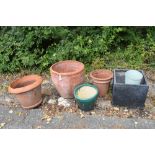 Group of six assorted garden planters to include; three terracotta examples, largest 51cm diameter x