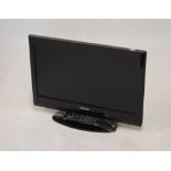 Toshiba LCD television with remote, and a Panasonic DVD player/recorder