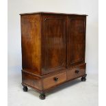 19th Century mahogany press cupboard fitted two blind panel doors enclosing two shelves, the base