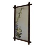 Late Victorian rectangular painted mirror, within a chamfered oak frame, the reverse with the