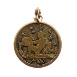 Small yellow metal medallion depicting a classical figure pouring water from an urn, stamped 750