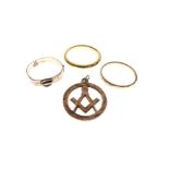 Yellow metal Masonic fob stamped 9c, an unmarked yellow metal wedding band and two other metal