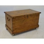 Late 19th/early 20th Century pine chest having hinged cover, 36cm x 63cm x 36cm