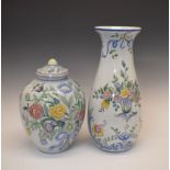 Pair of Portuguese pottery vases having hand painted decoration of flowers, 42.5cm high, the smaller