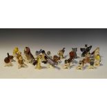 Group of twenty-four Goebel porcelain bird figurines, together with a bear (25)
