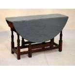 Antique oak gateleg table with painted top, 116cm wide