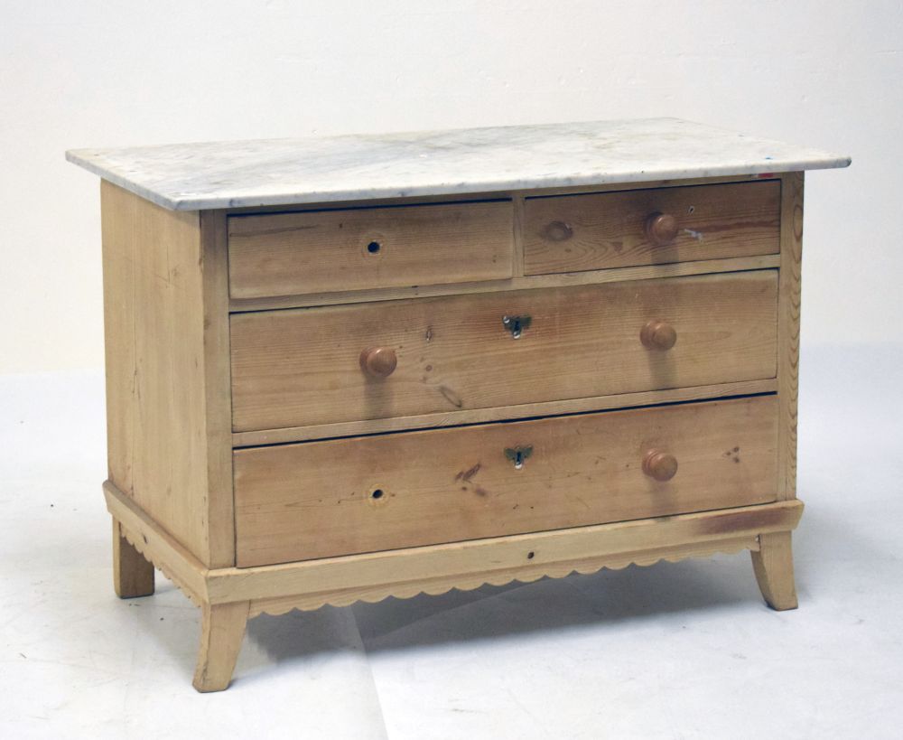 Marble-topped stripped pine washstand or chest of two short over two long drawers on swept bracket
