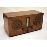 1930's period McMichael twin supervox walnut cased radio fitted Bakelite knobs and sunburst fretwork