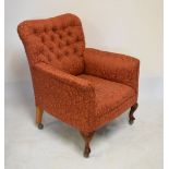 Early 20th Century beech framed armchair having button back upholstery, on cabriole front supports