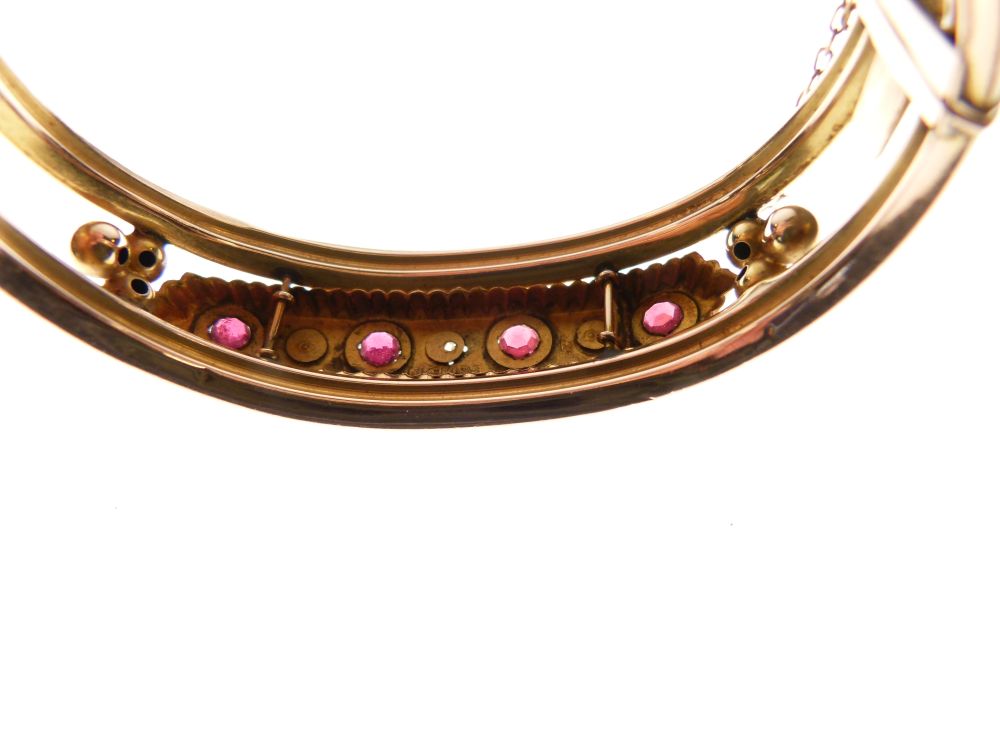 Edwardian 9ct rose gold snap bangle set a central band of red stones and diamond points, 12.5g - Image 3 of 4