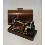 Cased Singer sewing machine