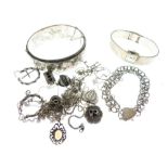 Assorted silver and white metal jewellery to include; silver snap bangle, a lady's wristwatch,