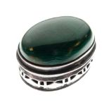 White metal and Malachite oval patch or pill box, the push-on cover inset with oval cabochon, the