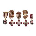 Five British Red Cross Society enamel badges awarded to E. Clarke, with various clasps for Red Cross