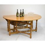 Reproduction oak circular gate leg dining table, 163cm diameter