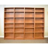 Four floor standing modular bookshelves, each fitted five adjustable shelves in ash finish,