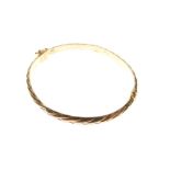 9ct gold snap bangle of plaited design, 8.5g approx