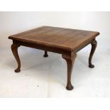 Early 20th Century oak rectangular extending dining table raised on cabriole supports, 125cm x 102cm