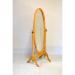 Blonde wood oval cheval mirror, 158cm high x 63cm wide overall