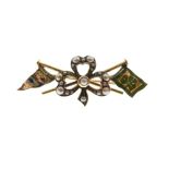 Irish Interest - Yellow metal, seed pearl and enamel bar brooch decorated with central seed pearl
