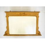 Early 20th Century giltwood overmantel mirror having bevelled rectangular plate between fluted