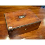 19th Century yew wood veneered lady's work box, the hinged cover with inlaid rectangular mother-of-