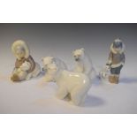 Two Lladro porcelain figurines of Eskimo children playing with polar bears, together with three