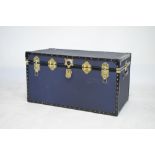 Travel trunk with hinged cover, covered in blue canvas, 92cm wide x 49cm high x 50cm deep