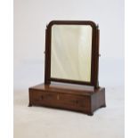 George III inlaid mahogany dressing mirror, the cross grain-moulded shaped plain mirror plate on