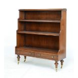 Good quality reproduction mahogany waterfall bookcase fitted four shelves with two short drawers