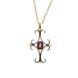 9ct gold pendant set central faceted oval ruby-coloured stone within seed pearls, together with a