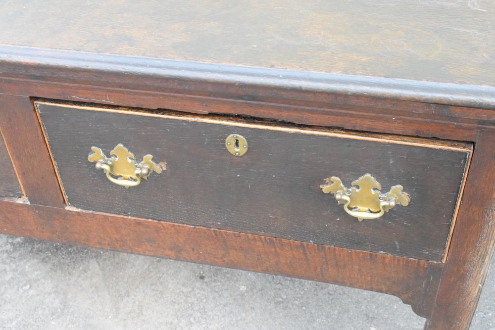 18th Century oak dresser base fitted three drawers with brass swan neck handles, raised on turned - Image 7 of 8