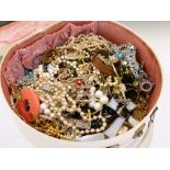 Vintage dressing case containing a selection of costume jewellery to include bead necklaces,